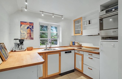 Rrvig House | Nice cottage with wood stove and idyllic garden, close to wonderful sandy beach.
