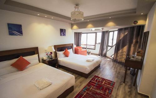 Al Duqqi Hotel | Nile Guardian Hotel