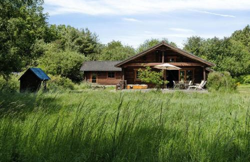 Øster Melholt House | Nordic Log Cabin With Views Over The Fields