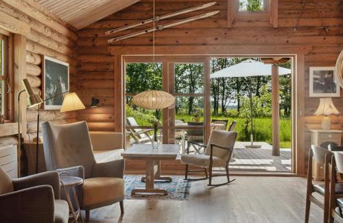 Øster Melholt House | Nordic Log Cabin With Views Over The Fields