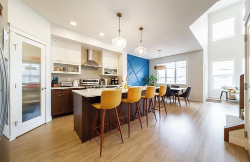West Edmonton House | Nordic Oasis near WEM | Hot Tub, 2 Lounges, King Ensuite Sleeps 10