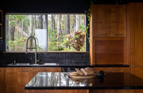 Point Lookout House | Norm’s Place - a secluded, unique, absolute water front property at Amity Point