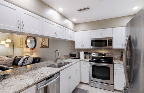 Holmes Beach House | North Beach Village #62 by Duncan Real Estate