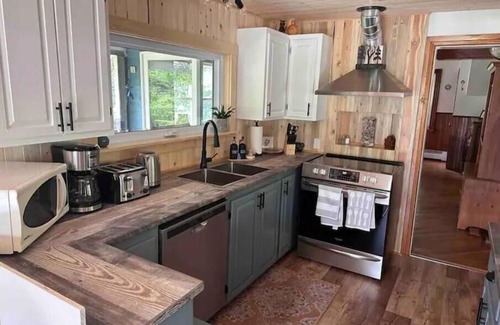 Tarbot House | North River LodgenBeautiful Century home with 4 bedrooms and 3 bathrooms