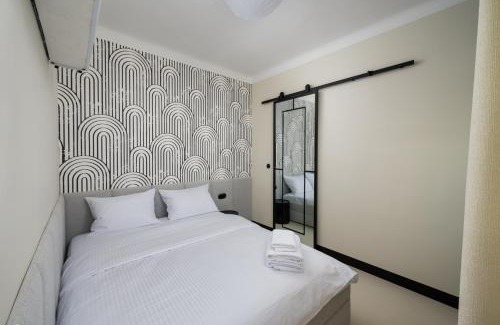Muranow Apartment | Nowolipki Deluxe Grey Studio