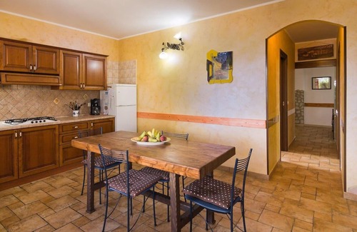 Gonnesa Apartment | Nuraghe vacation apartment on an olive grove on the outskirts of the town, barrier-free, WLAN,