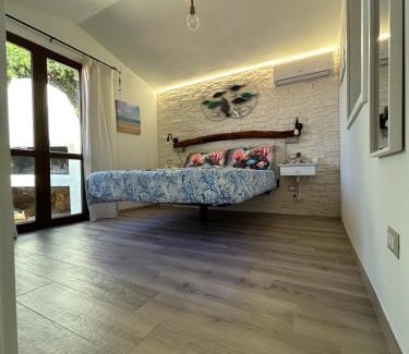 Torre dei Corsari Apartment | Oasi del Relax - Seaside Peaceful Panoramic Terrace in ITALY - new Sardinia apartment 50 mt beach&sea full comfort air conditioning-WiFi-Parking-Privacy