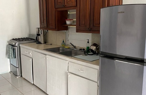 Orange Walk House | Oasis Guest House a hidden gem in a cozy part of town .