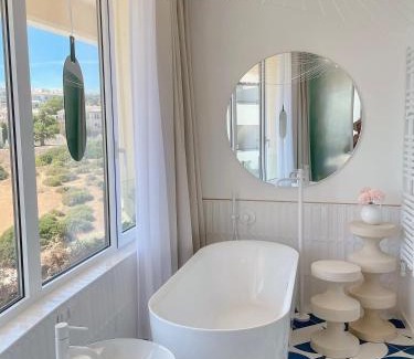 Porto de Mos Apartment | Ocean Apartment by ENDLESS SUN I modern comfort, sea view, wi-fi, parking & rooftop pool