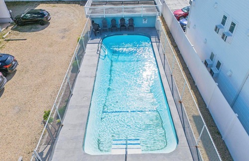 Sussex County House | Ocean Block Townhouse in Dewey Beach – 4 Decks, Pool, Steps to the Sand!