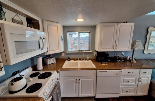 Smith River Cabin | Ocean Cabin 23 is a cozy seaside bungalow with loft, limited ocean views, and private beach. Hot tub temporarily unavailable