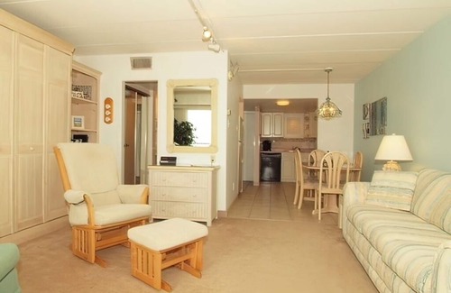 South Rehoboth Condo | OCEAN FRONT CONDO. ENJOY YOUR MORNING COFFEE SITTING ON YOUR PRIVATE BALCONY WATCHING THE SUNRISE.
