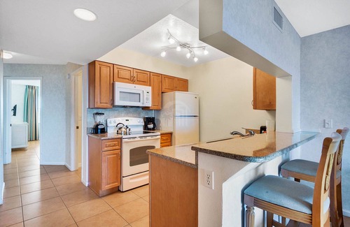 Port Canaveral Condo | Ocean Front Resort - 2BR Condo -Near the Pier - Tiki Bar - Pool - Game Room