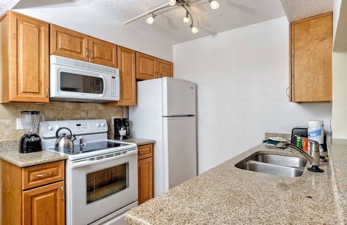 Port Canaveral Condo | Ocean Front Resort - 2BR Condo -Near the Pier - Tiki Bar - Pool - Game Room