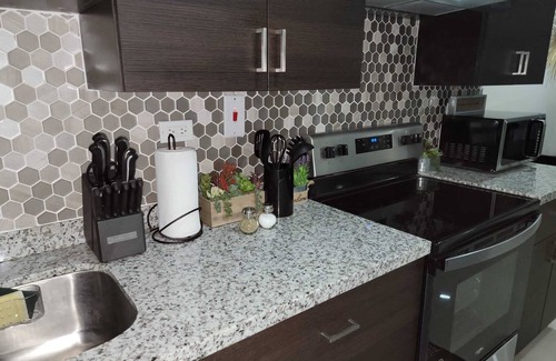 Portmore Condo | Ocean view 2bd 2br luxury apartment, with pool and private beach access.