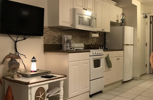 Crescent Beach Apartment | Ocean View And Poolside #104
