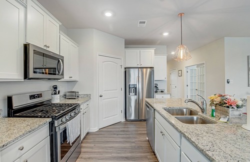 Ocean View House | Ocean View Beach Club home with bay view, private tennis court & pool access