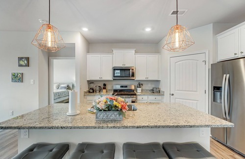Ocean View House | Ocean View Beach Club home with bay view, private tennis court & pool access
