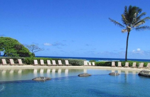 Hanamaulu Condo | Ocean-view condo - top floor - amazing resort pools, gym, spas, & restaurants