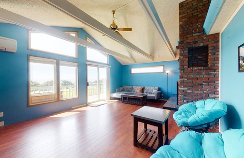 Yachats House | Ocean View Home w/ a Private Hot Tub, Wood Fireplace, Decks, & Garden