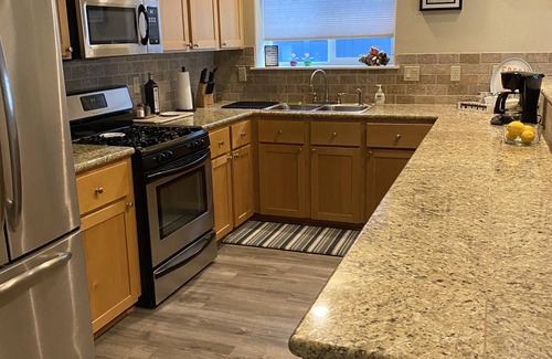 Gold Beach House | Ocean view townhouse Hot Tub. Pet Friendly. Two minute walk to the beach.