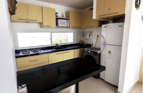 Playas Apartment | Oceanfront apartment, swimming pool, automatic check-in