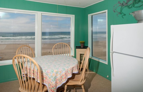 Newport House | Oceanfront beach cabin, enjoy beach views and the deck at this pet friendly home