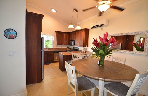 West Bay House | Oceanfront beach house with dual-masters & screened balcony on West Bay Beach