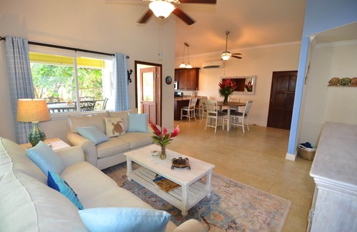 West Bay House | Oceanfront beach house with dual-masters & screened balcony on West Bay Beach