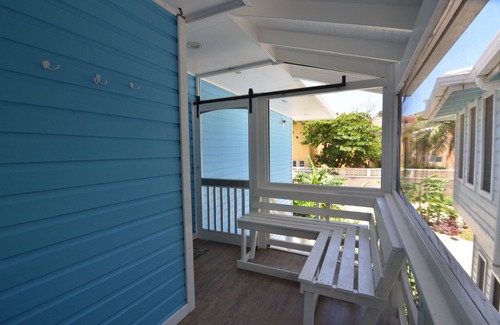 West Bay House | Oceanfront beach house with dual-masters & screened balcony on West Bay Beach