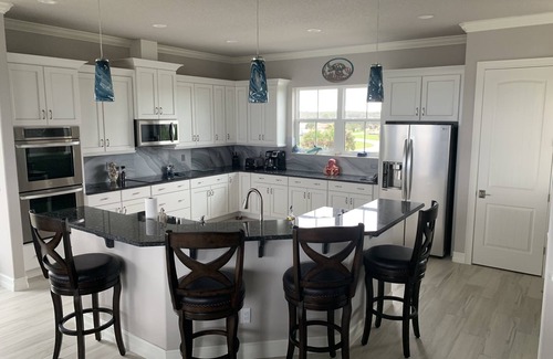 Palm Coast House | Oceanfront Executive Home with private beach and backyard dunes.