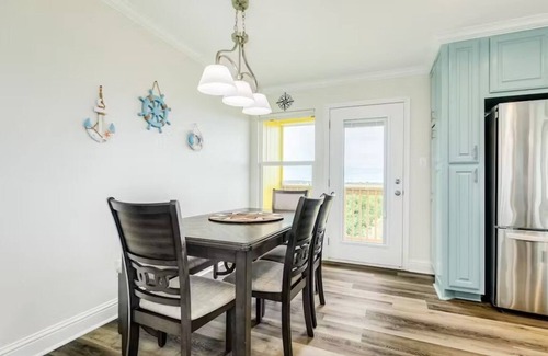 Port Bolivar House | Oceanfront Serene Coastal Escape in Crystal Beach, TX: Yellow Daisy by the Sea