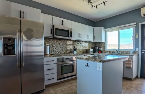 La Paz Apartment | Oceanview Getaway with Balcony, Pool & BBQ Access