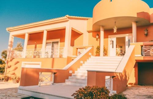 Akrotiri Villa | Olas y olivos