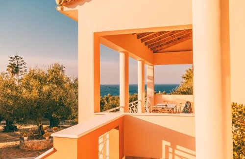 Akrotiri Villa | Olas y olivos