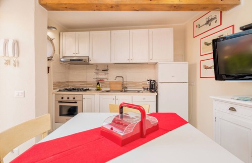 Olbia City Centre Apartment | Olbia Centre City Apartment with Private Terrace, Shared Garden, A/C & Wi-Fi