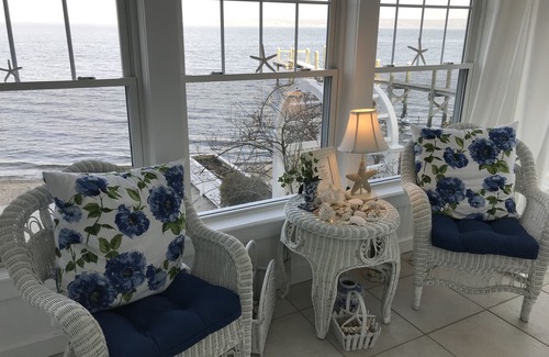 Bristol Cottage | Old fashioned designer front porch living by the sea with expansive water views.