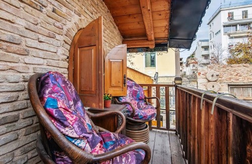 Kerameikos House | Olvion House: rustic stone retreat in Athens with a cozy private courtyard.
