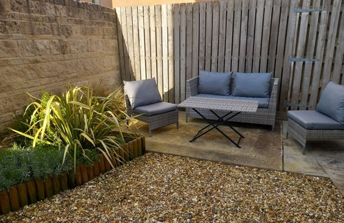 Portland Cottage | OLYMPIC COTTAGE, pet friendly, with a garden in Fortuneswell