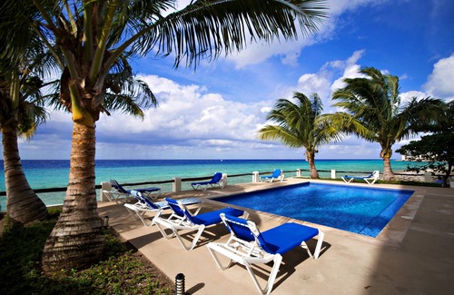 Zona Hotelera Norte Condo | On a White Sandy Beach, Beautiful artwork throughout the inside Condo#101