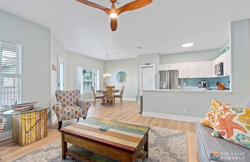 New Smyrna Beach Condo | ON Flagler Avenue! Dog Friendly with Balcony and Parking. Walk to the Beach!
