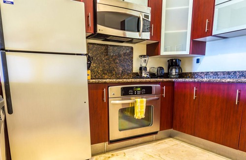 Playa del Carmen Cottage | On the Beach - 2 Bedroom Condo at El Faro by BRIC Vacation Rentals