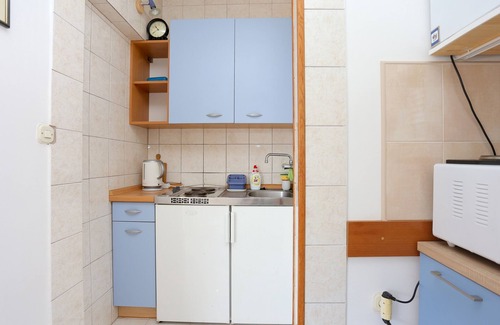 Municipality of Trogir Apartment | One bedroom apartment with terrace and sea view Arbanija, Čiovo (A-18797-b)