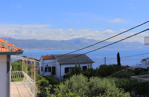 Municipality of Trogir Apartment | One bedroom apartment with terrace and sea view Arbanija, Čiovo (A-18797-b)