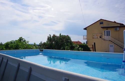 Rab Apartment | One bedroom apartment with terrace and sea view Barbat, Rab (A-4988-b)