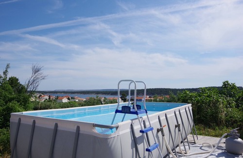 Rab Apartment | One bedroom apartment with terrace and sea view Barbat, Rab (A-4988-b)