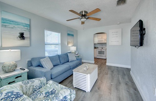 Treasure Island Resort | One bedroom poolside suite. Steps to beach and John’s Pass. HEATED POOL.