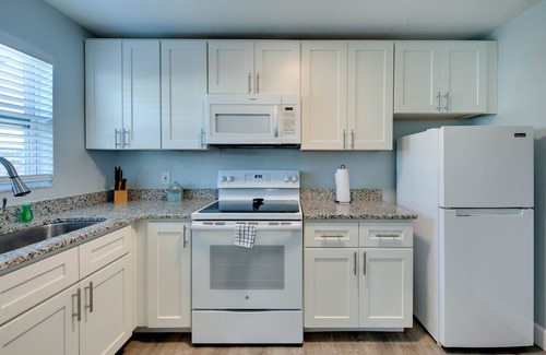 Treasure Island Resort | One bedroom poolside suite. Steps to beach and John’s Pass. HEATED POOL.