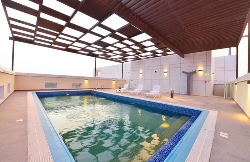 Khalifa City Apartment | One Bedroom Suite Near In Field Super Market By Luxury Bookings