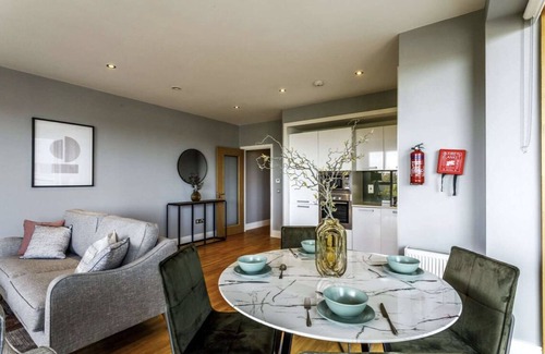 Dublin Apartment | One bedroom with a double bed, bathroom and kitchen with spacious living space.